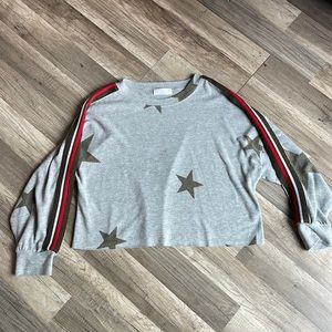 Long sleeve grey star shirt with stripes on the side. Twenty5A brand Size L